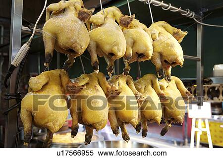 Chicken hanging from hook View Large Photo Image Stock Photography - Chicken hanging from hook. Fotosearch