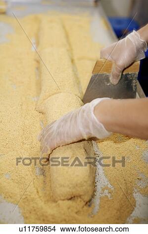 Picture - One person making maltose. Fotosearch