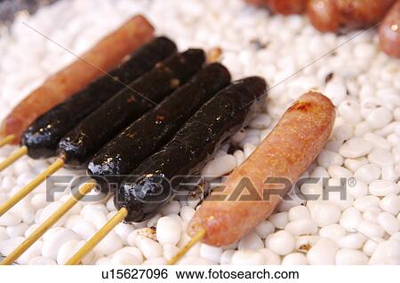 Sausage stuffed with Flying Fish Roe and cuttlefish sausage on the gravel View Large Photo Image Stock Photograph - Sausage stuffed with Flying Fish Roe and cuttlefish sausage on the gravel. Fotosearch