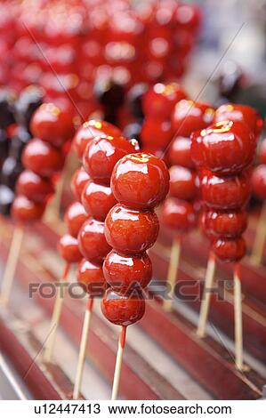 Stock Image - Tomatoes On Sticks. Fotosearch