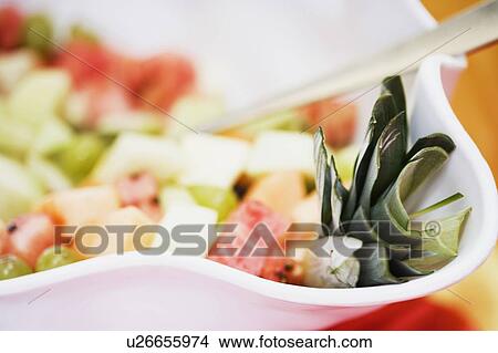 Picture - Close-up of a bowl of fruit salad. Fotosearch