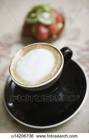 Stock Photograph - Close-up of a coffee cup on a saucer. Fotosearch