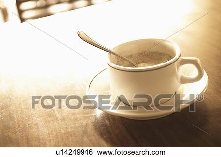 Stock Photograph - Close-up of a cup of coffee. Fotosearch