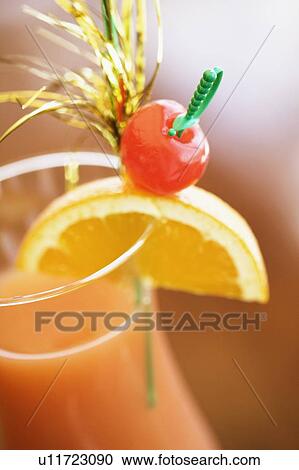 Close-up of a glass of cocktail View Large Photo Image Stock Image - Close-up of a glass of cocktail. Fotosearch