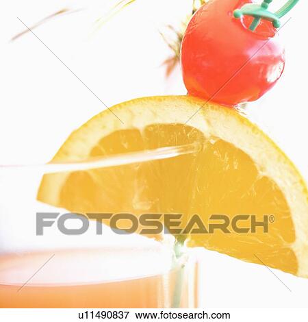 Stock Photo - Close-up of a glass of cocktail. Fotosearch