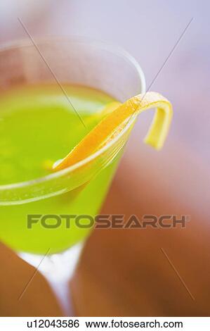 Close-up of a glass of cocktail View Large Photo Image Stock Photograph - Close-up of a glass of cocktail. Fotosearch