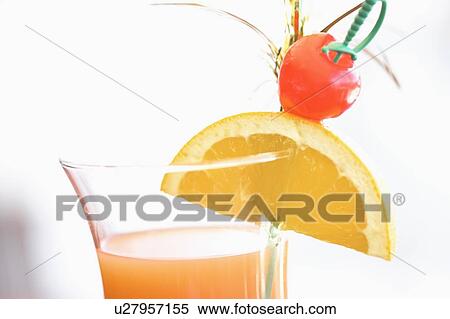 Stock Photography - Close-up of a glass of cocktail. Fotosearch