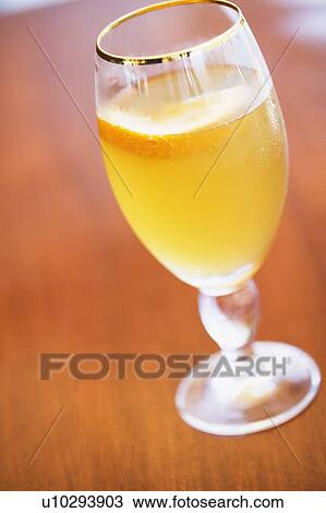Stock Image - Close-up of a glass of orange juice. Fotosearch