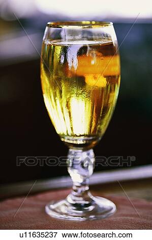 Stock Photo - Close-up of a glass of white wine. Fotosearch