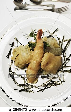 Stock Image - Close-up of a seafood in a plate. Fotosearch