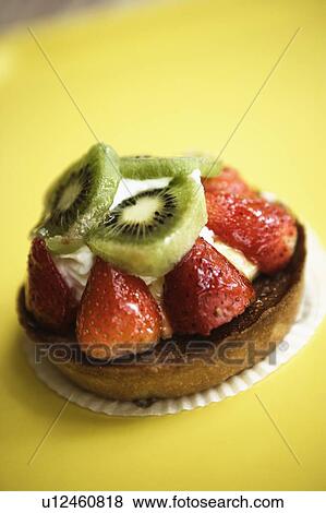 Stock Photo - Close-up of a strawberry tart on a serving tray. Fotosearch