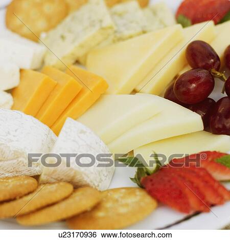 Close-up of assorted food on a plate View Large Photo Image Stock Photograph - Close-up of assorted food on a plate. Fotosearch