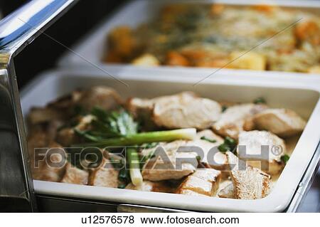 Close-up of chicken and leek in a container View Large Photo Image Stock Photo - Close-up of chicken and leek in a container. Fotosearch