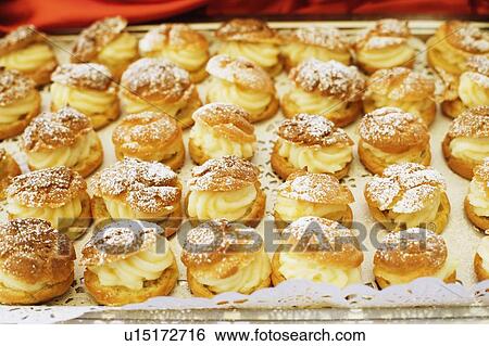 Stock Photograph - Close-up of scones in a tray. Fotosearch