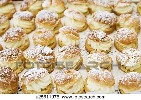 Stock Photograph - Close-up of scones in a tray. Fotosearch