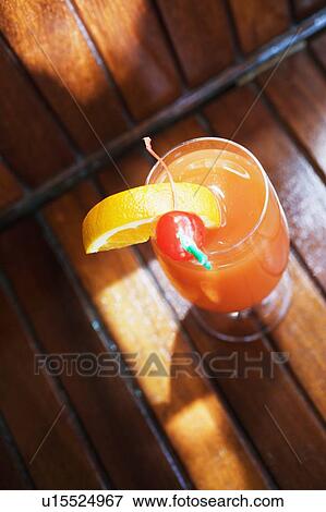 High angle view of a glass of cocktail View Large Photo Image Stock Photo - High angle view of a glass of cocktail. Fotosearch