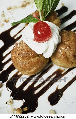 High angle view of cookies topped with whipped cream View Large Photo Image Stock Image - High angle view of cookies topped with whipped cream. Fotosearch