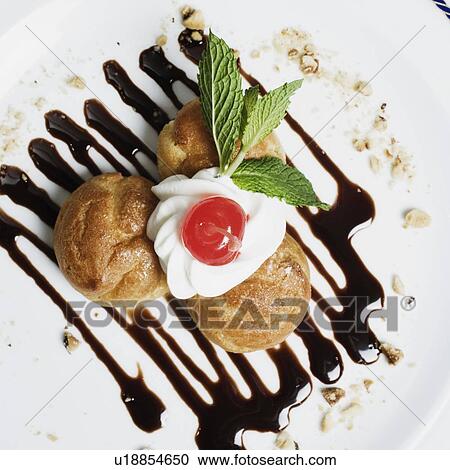 High angle view of cookies topped with whipped cream View Large Photo Image Stock Image - High angle view of cookies topped with whipped cream. Fotosearch