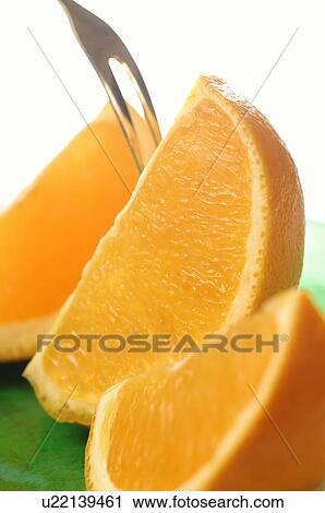 Stock Image - Cut Orange. Fotosearch