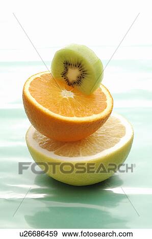 Half Cut of Kiwi Fruit, Orange and Grapefruit View Large Photo Image Stock Photo - Half Cut of Kiwi Fruit, Orange and Grapefruit. Fotosearch