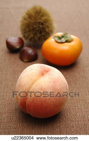 Peach, Persimmon and Chestnut View Large Photo Image Picture - Peach, Persimmon and Chestnut. Fotosearch