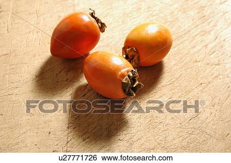 Stock Photograph - Persimmon. Fotosearch