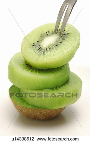 Stock Image - Sliced Kiwi Fruit. Fotosearch