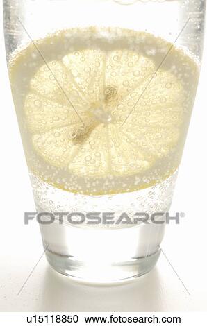 Soda water with sliced lemon View Large Photo Image Stock Image - Soda water with sliced lemon. Fotosearch