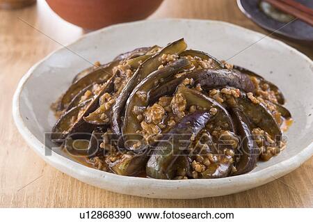 Stock Image - Fried Eggplant with Chili Sauce. Fotosearch
