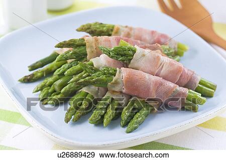Stock Photo - Green Asparagus with Bacon. Fotosearch