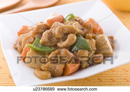 Stir Fried Chicken and Cashew Nuts View Large Photo Image Stock Photo - Stir Fried Chicken and Cashew Nuts. Fotosearch
