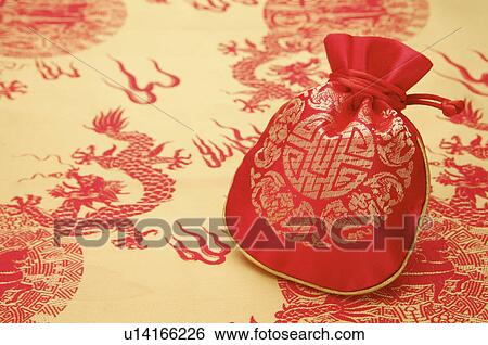 Stock Photograph - Knick Knack, Purse in traditional patterns. Fotosearch