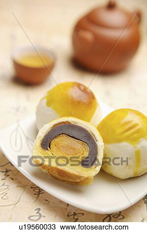 Stock Image - Tea, Egg York Pastry. Fotosearch