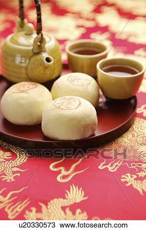 Stock Image - Tea, Egg York Pastry. Fotosearch