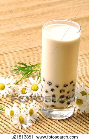 Stock Image - Close-up of a glass of pearl milk tea. Fotosearch
