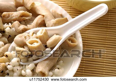 Stock Image - Close-up of a Taiwanese herbal soup. Fotosearch