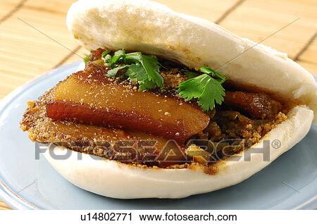 Close-up of a Taiwanese style burger, guo bao View Large Photo Image Stock Image - Close-up of a Taiwanese style burger, guo bao. Fotosearch