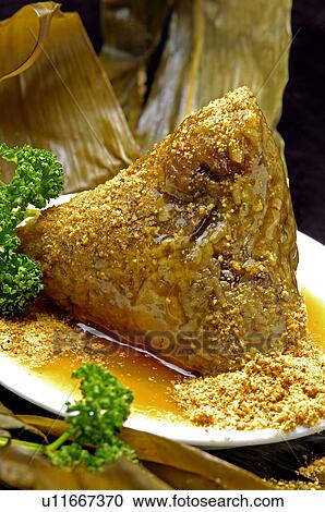 Close-up of bamboo leaf wrapped Zongzi View Large Photo Image Stock Image - Close-up of bamboo leaf wrapped Zongzi. Fotosearch