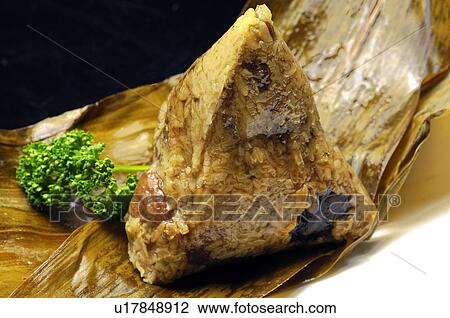 Close-up of bamboo leaf wrapped Zongzi View Large Photo Image Stock Image - Close-up of bamboo leaf wrapped Zongzi. Fotosearch