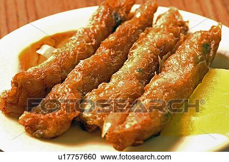 Stock Image - Close-up of Chinese shrimp rolls. Fotosearch