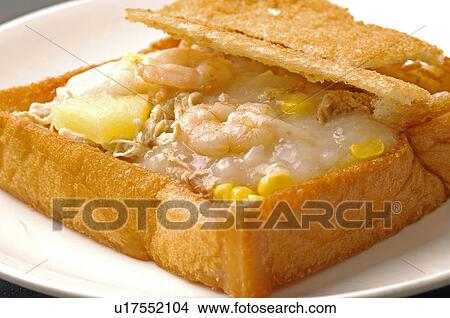Picture - Close-up of Oriental corn and shrimp fried in bread. Fotosearch