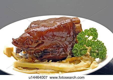 Stock Photo - Close-up of Oriental pork trotter with bamboo shoot. Fotosearch