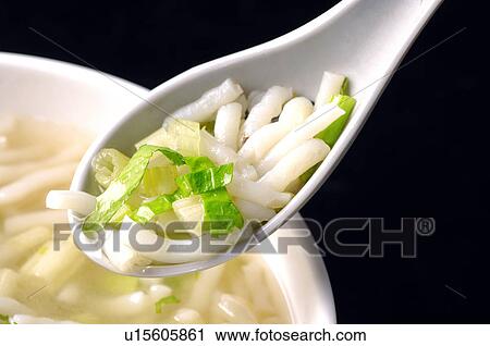 Close-up of rice-flour noodle soup in a spoon View Large Photo Image Stock Image - Close-up of rice-flour noodle soup in a spoon. Fotosearch