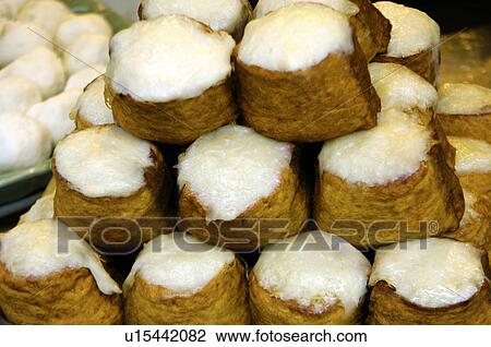 Stock Image - Close-up of stuffed fried tofu skin. Fotosearch