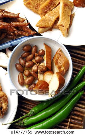 High angle view of fried chicken feet served with bread and peanuts View Large Photo Image Stock Photography - High angle view of fried chicken feet served with bread and peanuts. Fotosearch