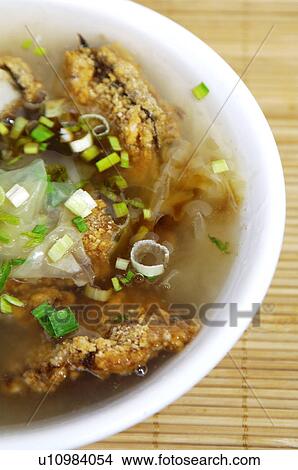 Picture - High angle view of Oriental clear seafood soup. Fotosearch