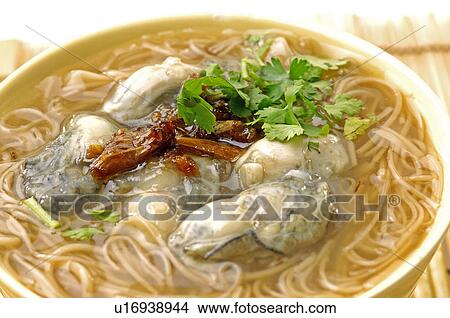 High angle view of oyster thin noodle soup View Large Photo Image Picture - High angle view of oyster thin noodle soup. Fotosearch