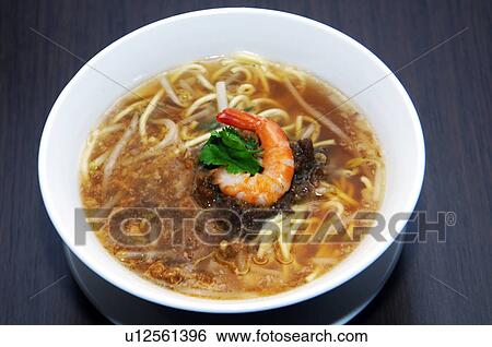 Stock Photograph - High angle view of prawn and noodle soup. Fotosearch