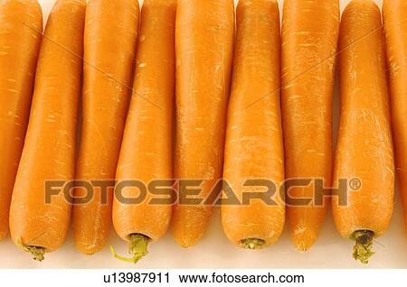 Stock Image - Close-up of carrots. Fotosearch