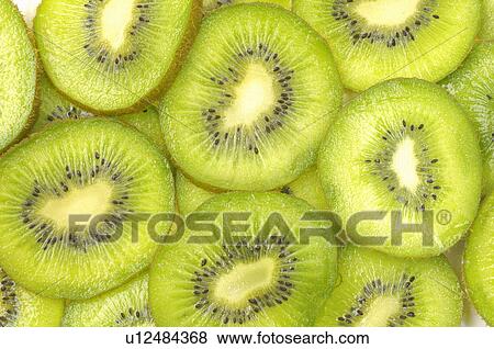 Stock Photo - Slices of kiwi fruits. Fotosearch
